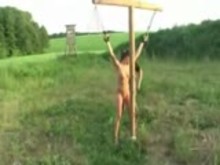 Suspension and crucifixion outdoors