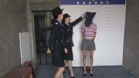 Chinese Woman Arrested and Cuffed