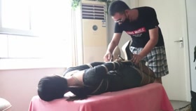 Hogtied Chinese on Sofa Table