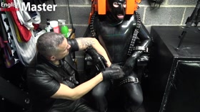 Rubber gimp has CBT on his small dick and balls PREVIEW